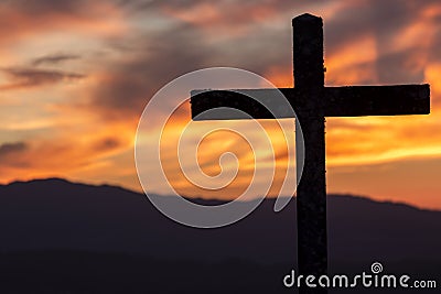 Religion theme, catholic cross and sunset Stock Photo