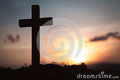 Religious concepts. Christian wooden cross on a background with dramatic lighting, Jesus Christ cross, Easter, resurrection Stock Photo