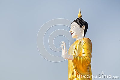 Religious concepts, Statue of Buddha in sky background Giant Buddha Statue Stock Photo