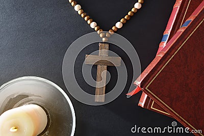 Religious elements on black table top view Stock Photo