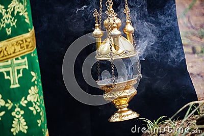 Golden censer smoke Stock Photo