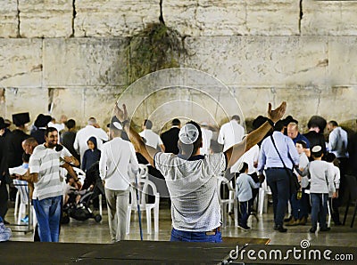 Religious men praying at the wailing wall in Jerusalem during Sukkot Editorial Stock Photo