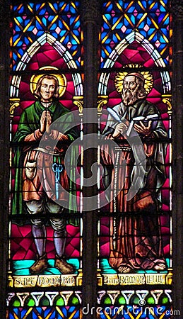 Religious picture on stained glass in the church Stock Photo