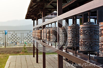 Religious prayer wheel for meditation in a Buddhist temple in Buryatia, Russia Ulan-Ude. Stock Photo