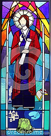 Religious stained glass window with Saint Luke, Queensland, Australia Stock Photo