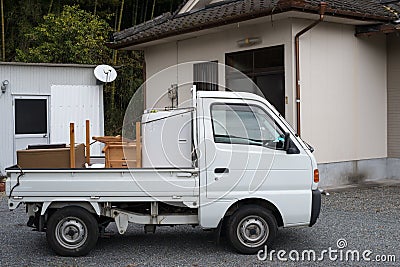 Relocation by light truck Stock Photo