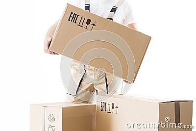 Relocation service man holds cardboard box in hand closeup isolated on white background. Loader worker with box. Stock Photo