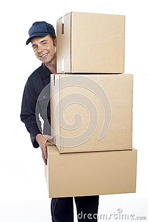 Relocation staff carrying cardboard boxes Stock Photo