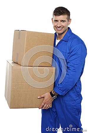 Relocation staff carrying cardboard boxes Stock Photo