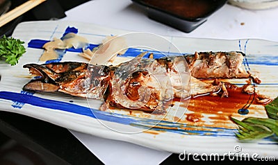 Remain of Grilled Saba fish with teriyaki sauce Stock Photo