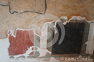 Remains of colorful stucco paints in Masada, ancient town Stock Photo