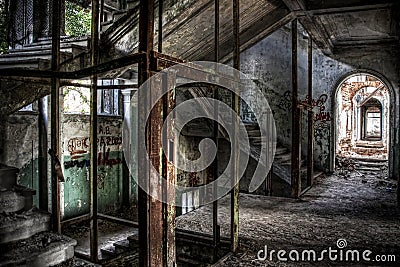 Remains of an elevator and an abandoned staircase Stock Photo
