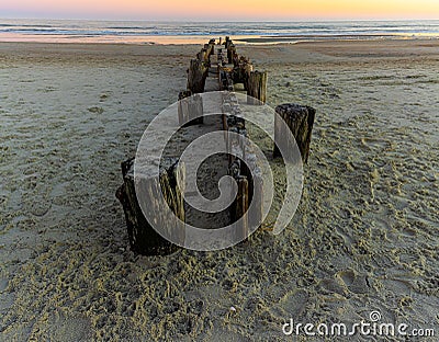 Remains of A Hurricane Damaged Pier on Folly Beach Stock Photo