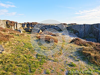 Ancient millstone quarry on Curbar Edge Stock Photo