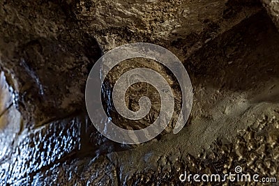 Remains of stone carving in the interior of the cave of St. Hieronymus under the Chapel of Saint Catherine in Bethlehem in Editorial Stock Photo