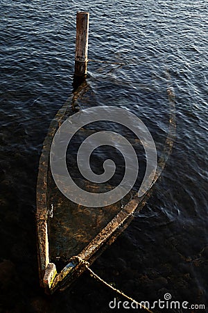 Remains of sunken fishing boat in croatian marina Stock Photo