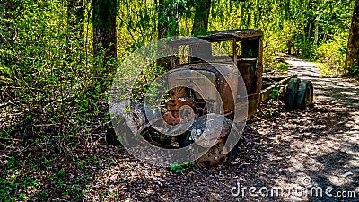 The remains of a Vintage Truck Wreck hidden in the forest surrounding Alta Lake near Whistler Stock Photo