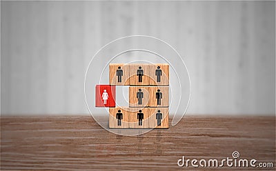 Remarkable business woman concept. Unique Red wood block with female figure icon. Businesswoman Leadership and individuality Stock Photo