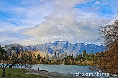 Remarkables mountains and lake Wakatipu in Queenstown, New Zealand Stock Photo