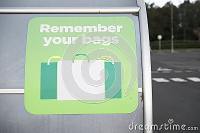 Remember to re-use your plastic bags for shopping to help reduce pollution and waste Stock Photo