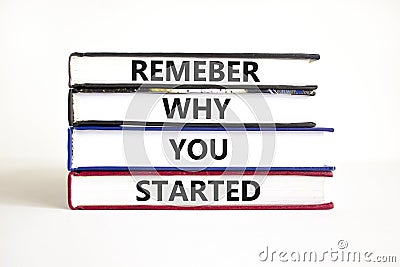 Remember why you started symbol. Concept word Remember why you started on beautiful book. Beautiful white table white background. Stock Photo