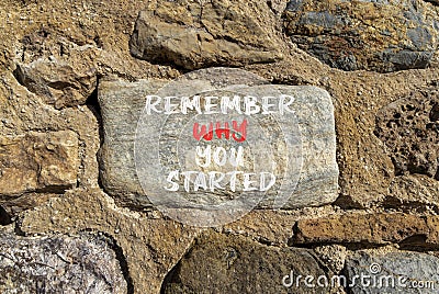 Remember why you started symbol. Concept word Remember why you started on beautiful stone. Beautiful stone wall background. Stock Photo