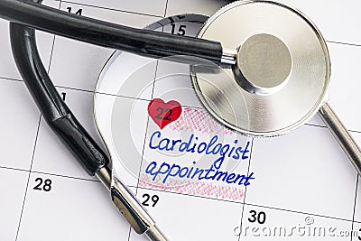 Reminder Cardiologist Appointment in calendar with stethoscope Stock Photo