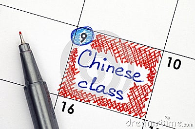 Reminder Chinese class in calendar with pen Stock Photo