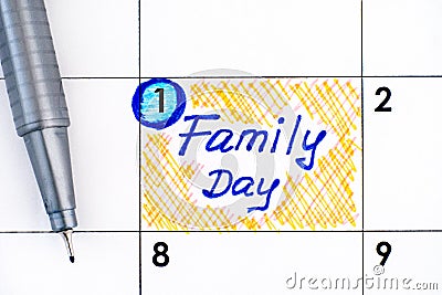 Reminder Family Day in calendar with pen Stock Photo