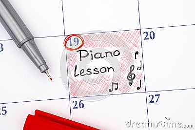 Reminder Piano Lesson in calendar Stock Photo