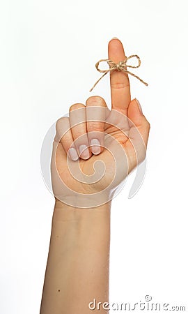 Reminder string around finger Stock Photo