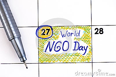 Reminder World NGO Day in calendar with pen Stock Photo