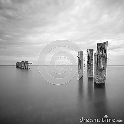 Remnants of an old pier Stock Photo