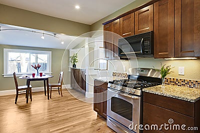 Remodel kitchen with wood flooring Stock Photo