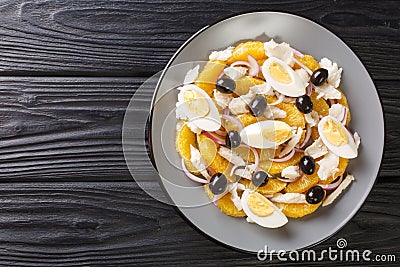 Remojon is a traditional Spanish salad made with a combination of oranges, salt cod, eggs, olive oil, olives, and wine vinegar Stock Photo