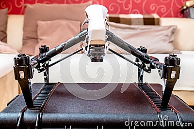 Remote control fly drone unit standing on hardcase Stock Photo