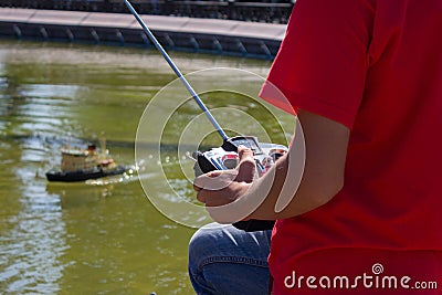 Remote control for sports model in the hands of boy Stock Photo