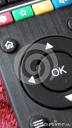 Remote controller button ok enter to sucsess home multimedia music videos Google Stock Photo