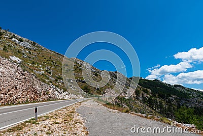 Remote desolated narrow roads, through multiple hairpin bends, leading down the mountain slopes to Pavlova Strana viewpoint Stock Photo