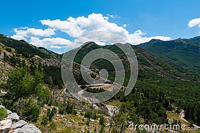 Remote desolated narrow roads, through multiple hairpin bends, leading down the mountain slopes to Pavlova Strana viewpoint Stock Photo