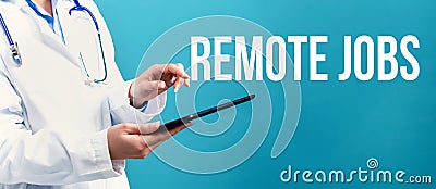 Remote Jobs theme with a doctor using a tablet Stock Photo