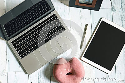 Remote work, SOHO, home office image with a computer and a tablet Editorial Stock Photo