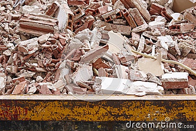 Removal of debris. Construction waste. Building demolition. Devastation Stock Photo