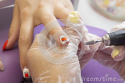 removal of gel polish hardware manicure.polishing the nail plate Stock Photo
