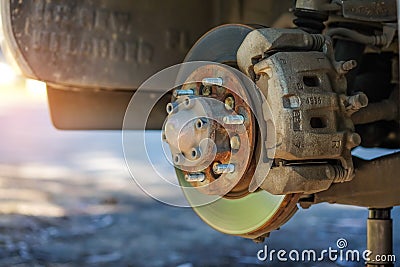 Remove the wheel to repair brake system. Stock Photo
