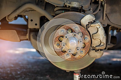 Remove the wheel to repair brake system. Stock Photo