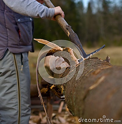 Removing bark from logs Stock Photo
