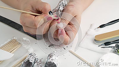 removing foil acetone containing
