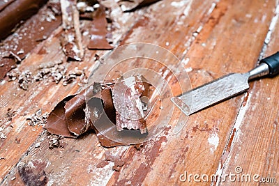 Removing paint from the floor with a hot air gun repair tools Stock Photo