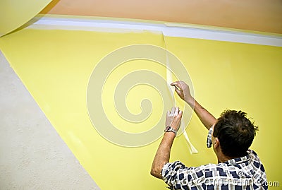 Removing paint tape Stock Photo